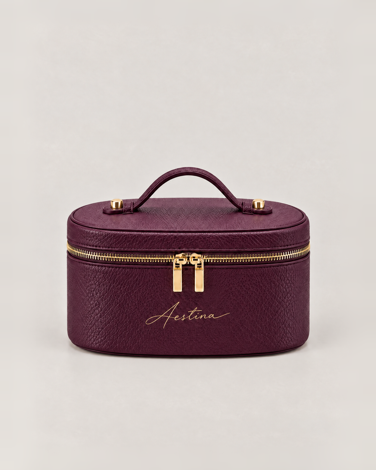 حقيبة مكياج (vanity) The Oval بلون Black Cherry من Aestina، شعار ذهبي، صورة 2